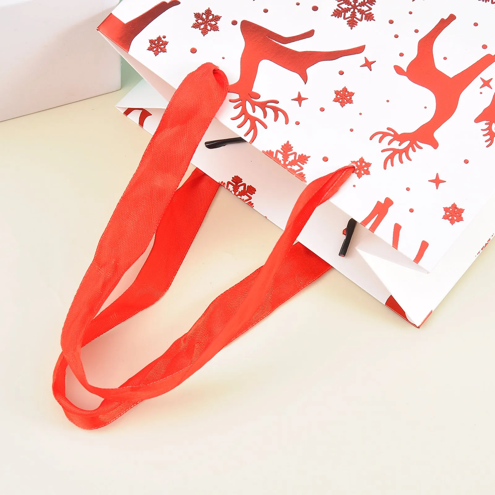 Merry Christmas With Reindeer And Stars Stylish Paper-Bag For Gifting.